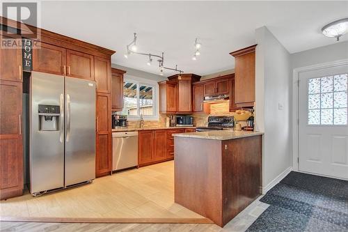 Beautiful modern kitchen with plenty of storage - 129 Spinnaker Way, Woodlawn, ON - Indoor Photo Showing Kitchen