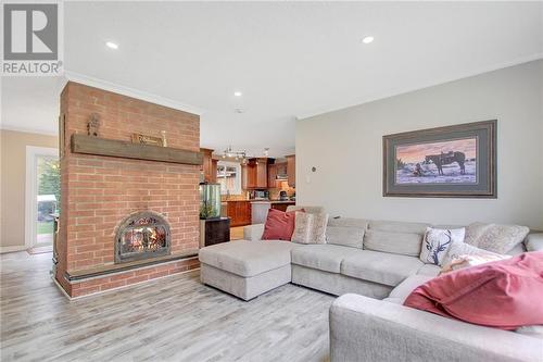 Livingroom with a cozy fireplace - 129 Spinnaker Way, Woodlawn, ON - Indoor Photo Showing Living Room With Fireplace