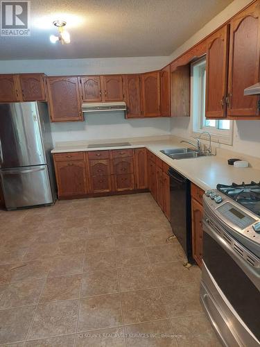 6 - 2548 Highway, Northern Bruce Peninsula, ON - Indoor Photo Showing Kitchen With Double Sink