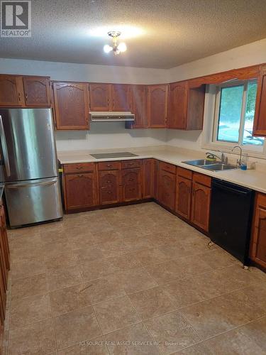 6 - 2548 Highway, Northern Bruce Peninsula, ON - Indoor Photo Showing Kitchen With Double Sink