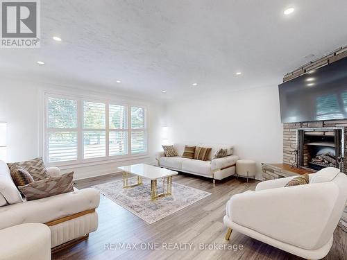 19 Orlanda Road, Hamilton, ON - Indoor Photo Showing Living Room With Fireplace