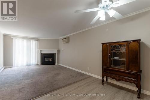 213 - 440 Wellington Street, St. Thomas, ON - Indoor With Fireplace