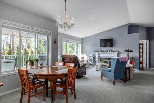 6-11290 Bond Road, Lake Country, BC - Indoor Photo Showing Dining Room With Fireplace