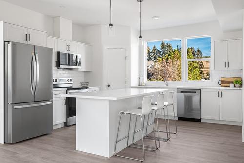 7-5661 Okanagan Landing Road, Vernon, BC - Indoor Photo Showing Kitchen With Stainless Steel Kitchen