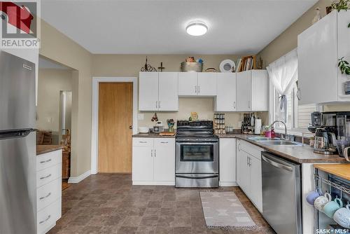 1302 7Th Avenue N, Saskatoon, SK - Indoor Photo Showing Kitchen With Stainless Steel Kitchen With Double Sink