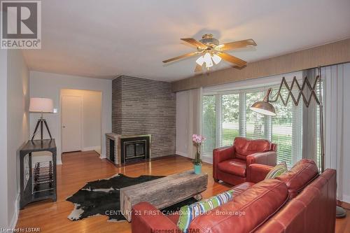 448 West Mile Road, London, ON - Indoor Photo Showing Living Room With Fireplace