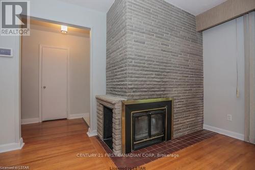 448 West Mile Road, London, ON - Indoor Photo Showing Living Room With Fireplace