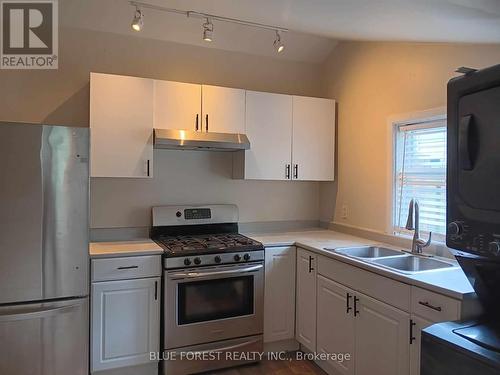 21 Queens Place, London, ON - Indoor Photo Showing Kitchen With Double Sink