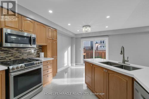 20 Edenvalley Road, Brampton (Fletcher'S Meadow), ON - Indoor Photo Showing Kitchen With Double Sink With Upgraded Kitchen