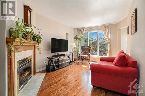 11 Kimberwick Crescent, Ottawa, ON - Indoor Photo Showing Living Room With Fireplace