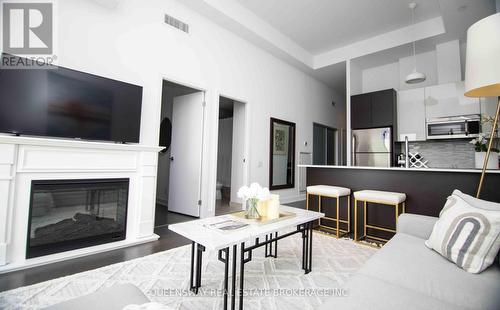 601 - 1815 Yonge Street, Toronto (Mount Pleasant West), ON - Indoor Photo Showing Living Room With Fireplace