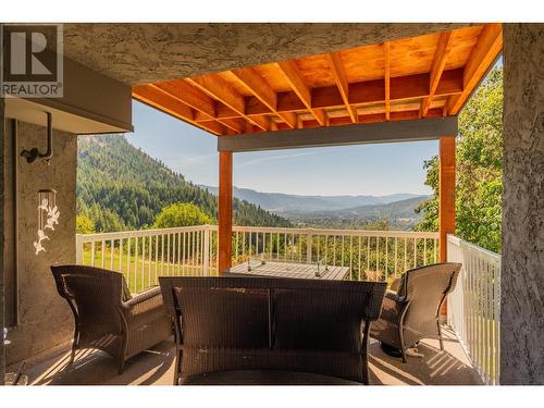 1457 Pass Creek Road, Pass Creek, BC - Outdoor With Deck Patio Veranda With View With Exterior