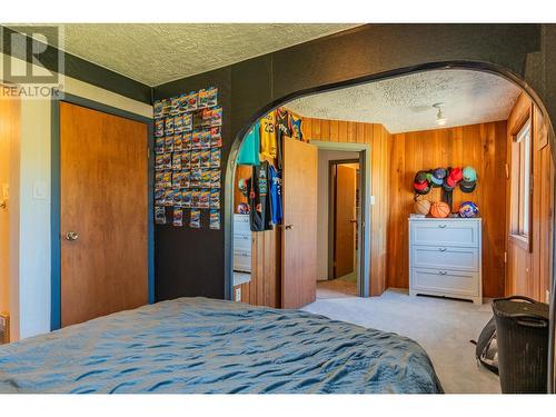 1457 Pass Creek Road, Pass Creek, BC - Indoor Photo Showing Bedroom