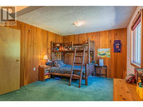 1457 Pass Creek Road, Pass Creek, BC - Indoor Photo Showing Bedroom