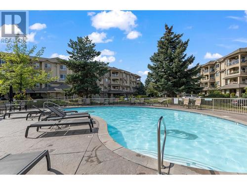 1962 Enterprise Way Unit# 411, Kelowna, BC - Outdoor With In Ground Pool