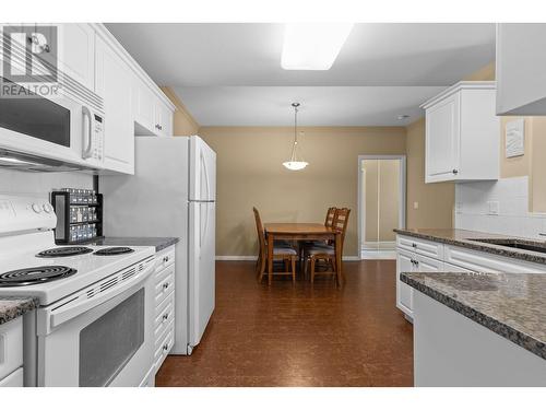 1962 Enterprise Way Unit# 411, Kelowna, BC - Indoor Photo Showing Kitchen