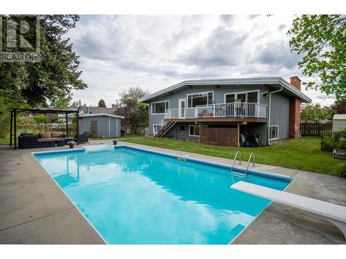 990 Fairway Crescent, Kelowna, BC - Outdoor With In Ground Pool With Deck Patio Veranda With Backyard