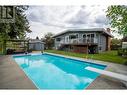 990 Fairway Crescent, Kelowna, BC  - Outdoor With In Ground Pool With Deck Patio Veranda With Backyard 