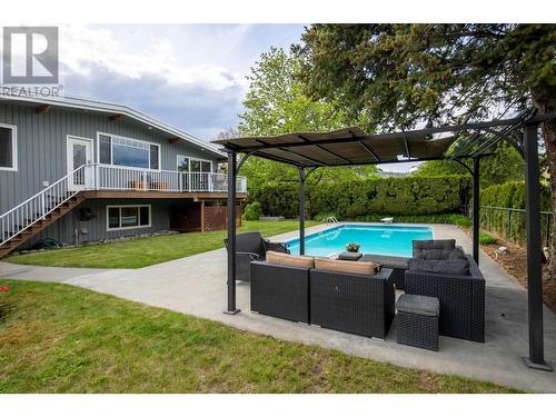 990 Fairway Crescent, Kelowna, BC - Outdoor With In Ground Pool With Deck Patio Veranda