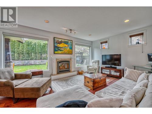 5254 Cobble Crescent, Kelowna, BC - Indoor Photo Showing Living Room With Fireplace