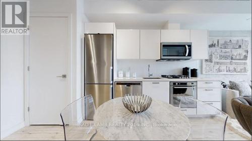 1410 - 55 Ontario Street, Toronto (Moss Park), ON - Indoor Photo Showing Kitchen With Stainless Steel Kitchen