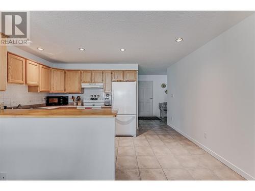 6909 Manning Place Unit# 2, Vernon, BC - Indoor Photo Showing Kitchen