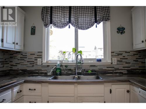 9220 89 Street, Fort St. John, BC - Indoor Photo Showing Kitchen With Double Sink