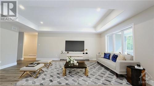 Living Room virtually staged - 116 Storyland Road, Renfrew, ON - Indoor Photo Showing Living Room