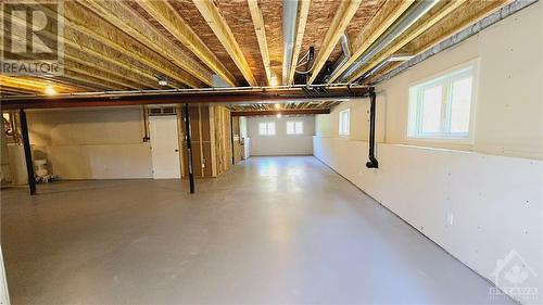 Deck is virtually staged. - 116 Storyland Road, Renfrew, ON - Indoor Photo Showing Basement