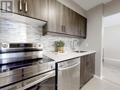 510 - 40 Bay Mills Boulevard, Toronto (Tam O'Shanter-Sullivan), ON - Indoor Photo Showing Kitchen With Upgraded Kitchen