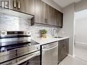 510 - 40 Bay Mills Boulevard, Toronto (Tam O'Shanter-Sullivan), ON  - Indoor Photo Showing Kitchen With Upgraded Kitchen 