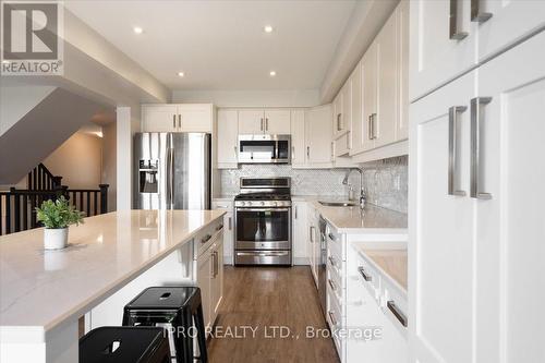 7739 Shaw Street, Niagara Falls, ON - Indoor Photo Showing Kitchen With Upgraded Kitchen