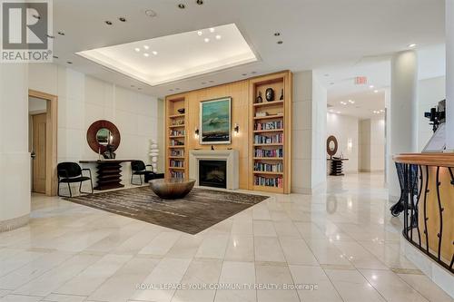 515 - 503 Beecroft Road, Toronto, ON - Indoor Photo Showing Other Room With Fireplace