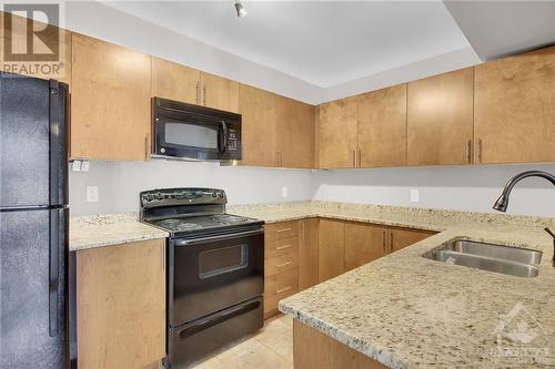 1250 Mcwatters Road Unit#11, Ottawa, ON - Indoor Photo Showing Kitchen With Double Sink