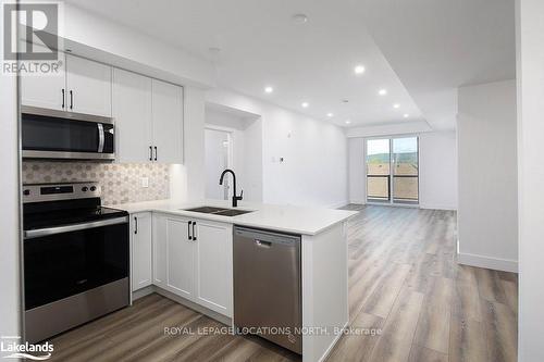 318 - 4 Kimberly Lane, Collingwood, ON - Indoor Photo Showing Kitchen With Double Sink With Upgraded Kitchen