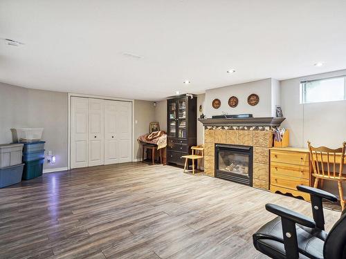 Salle familiale - 1099 Boul. Iberville, Repentigny (Repentigny), QC - Indoor Photo Showing Living Room With Fireplace