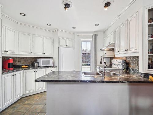 Cuisine - 1099 Boul. Iberville, Repentigny (Repentigny), QC - Indoor Photo Showing Kitchen With Double Sink With Upgraded Kitchen