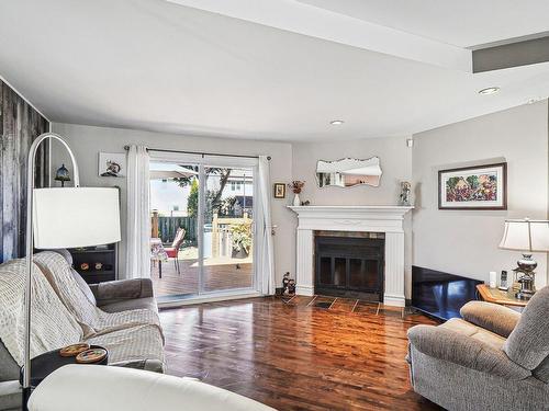 Salon - 1099 Boul. Iberville, Repentigny (Repentigny), QC - Indoor Photo Showing Living Room With Fireplace