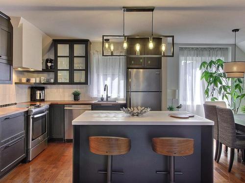 Cuisine - 12-17 Rue De Montbrun, Boucherville, QC - Indoor Photo Showing Kitchen With Upgraded Kitchen