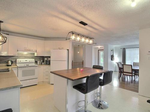 Overall view - 701 3E Avenue, Barraute, QC - Indoor Photo Showing Kitchen With Double Sink