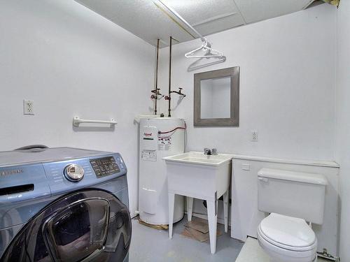 Powder room - 701 3E Avenue, Barraute, QC - Indoor Photo Showing Laundry Room