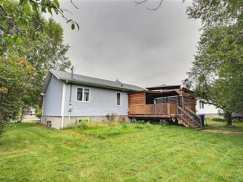 Back facade - 701 3E Avenue, Barraute, QC - Outdoor With Exterior