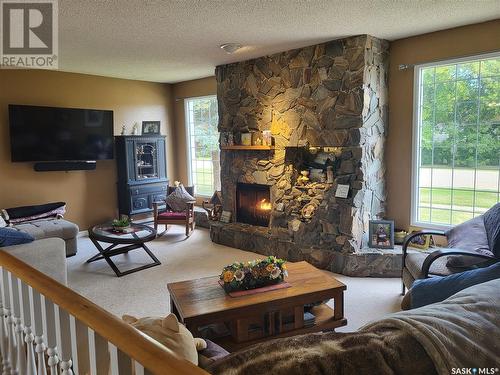 329 1St Avenue, St.Benedict, SK - Indoor Photo Showing Living Room With Fireplace