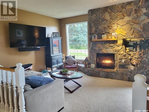 329 1St Avenue, St.Benedict, SK - Indoor Photo Showing Living Room With Fireplace