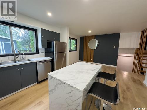 177 Procter Place, Regina, SK - Indoor Photo Showing Kitchen With Stainless Steel Kitchen With Double Sink