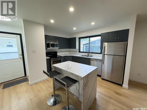 177 Procter Place, Regina, SK - Indoor Photo Showing Kitchen With Stainless Steel Kitchen With Double Sink