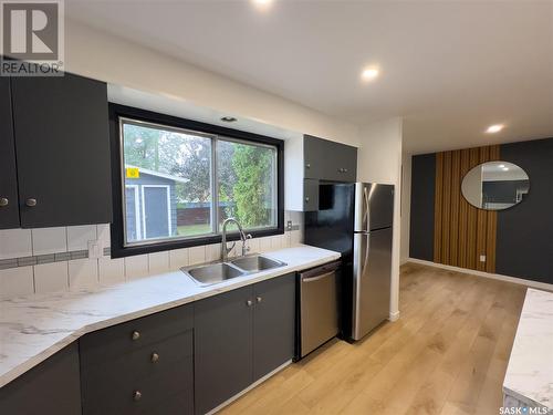 177 Procter Place, Regina, SK - Indoor Photo Showing Kitchen With Double Sink