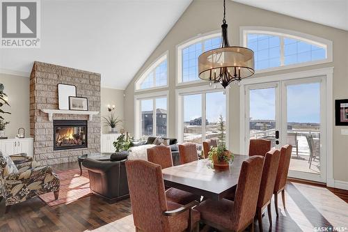 330 Spruce Creek Drive, Edenwold Rm No. 158, SK - Indoor Photo Showing Other Room With Fireplace