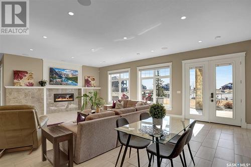 330 Spruce Creek Drive, Edenwold Rm No. 158, SK - Indoor Photo Showing Living Room With Fireplace