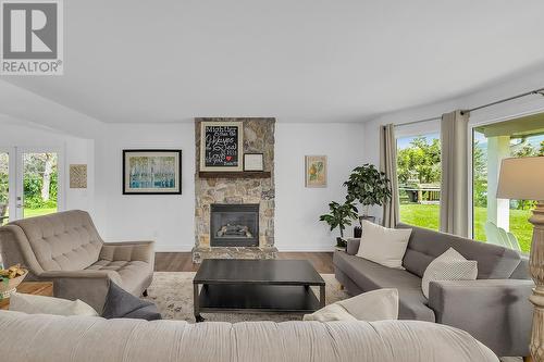 2378 Saucier Road, Kelowna, BC - Indoor Photo Showing Living Room With Fireplace